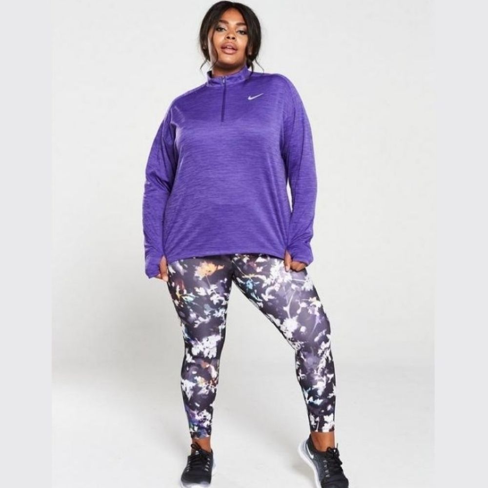 Nike the one Tight fit mid rise full length floral active workout leggings plus
